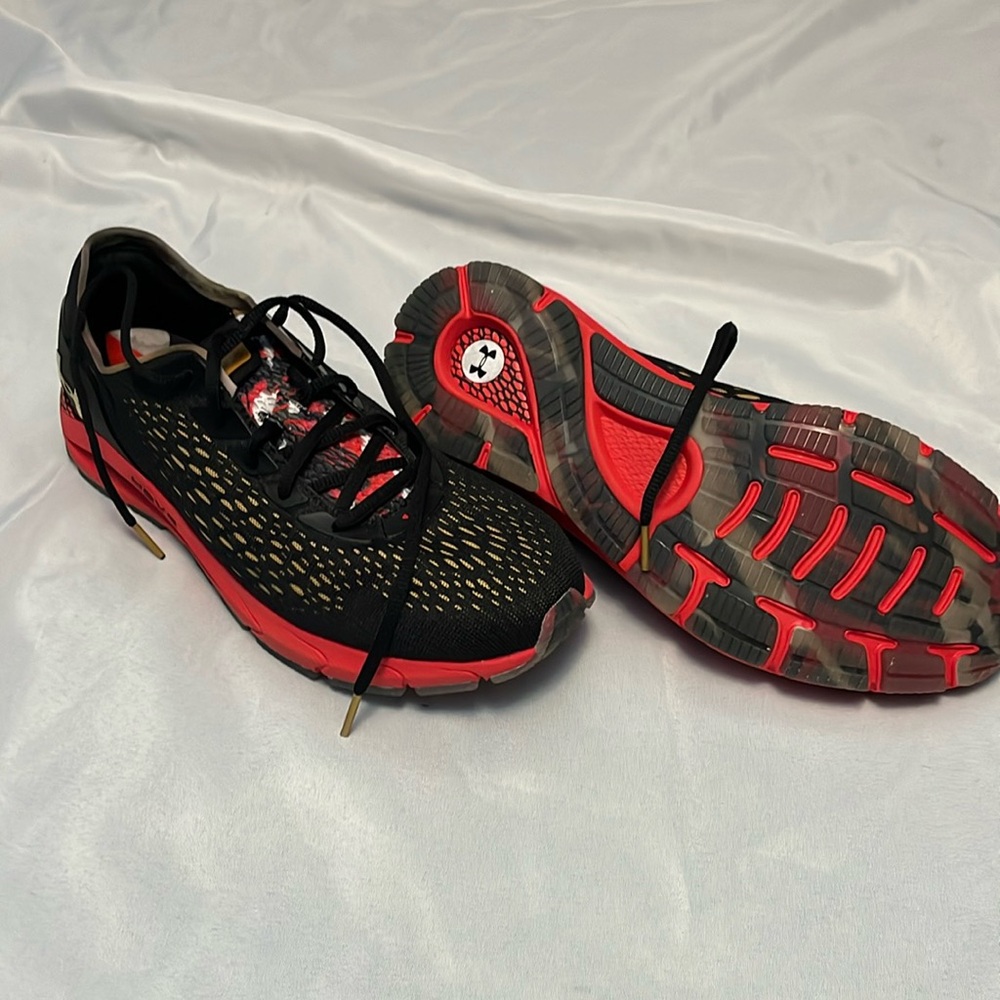 Black and red Under Armor tennis shoes,  Hovr running shoes